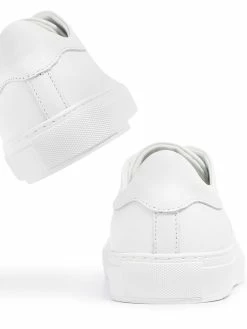 Axel Arigato baskets à détails brodés