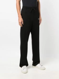 Axel Arigato pantalon de jogging droit à logo imprimé