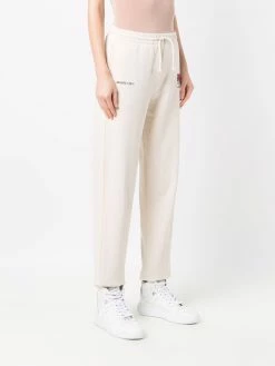 Axel Arigato pantalon de jogging à broderies Keith Haring