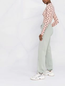 Axel Arigato pantalon de jogging à logo imprimé