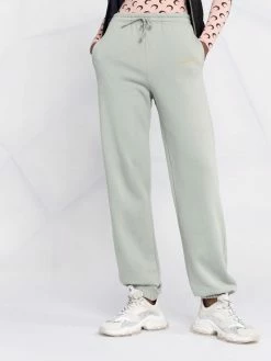 Axel Arigato pantalon de jogging à logo imprimé