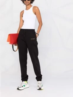 Axel Arigato pantalon de jogging à logo imprimé