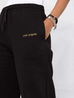 Axel Arigato pantalon de jogging à logo imprimé