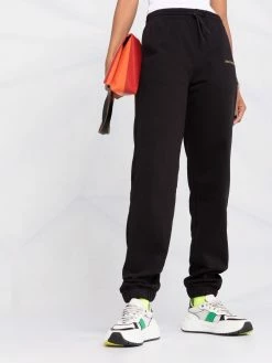 Axel Arigato pantalon de jogging à logo imprimé