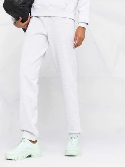 Axel Arigato pantalon de jogging à logo imprimé