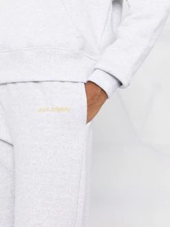 Axel Arigato pantalon de jogging à logo imprimé