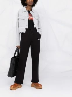 Axel Arigato pantalon de jogging à logo imprimé