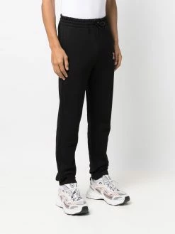 Axel Arigato pantalon de jogging slim à patch logo