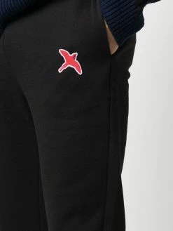 Axel Arigato pantalon de jogging slim à patch logo