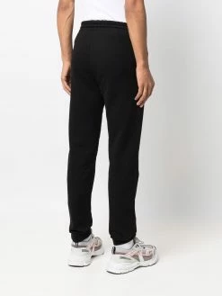Axel Arigato pantalon de jogging slim à patch logo